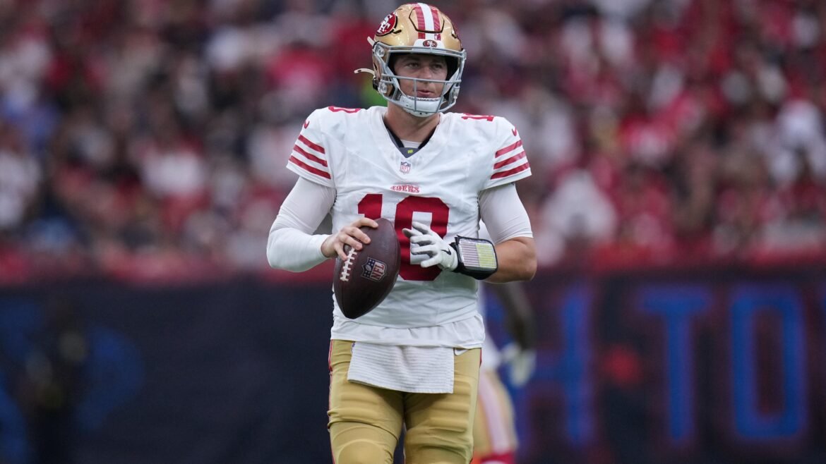 Rumores de Troca de Mac Jones Discutidos por Kyle Shanahan e John Lynch Amid Questões sobre o Futuro dos 49ers